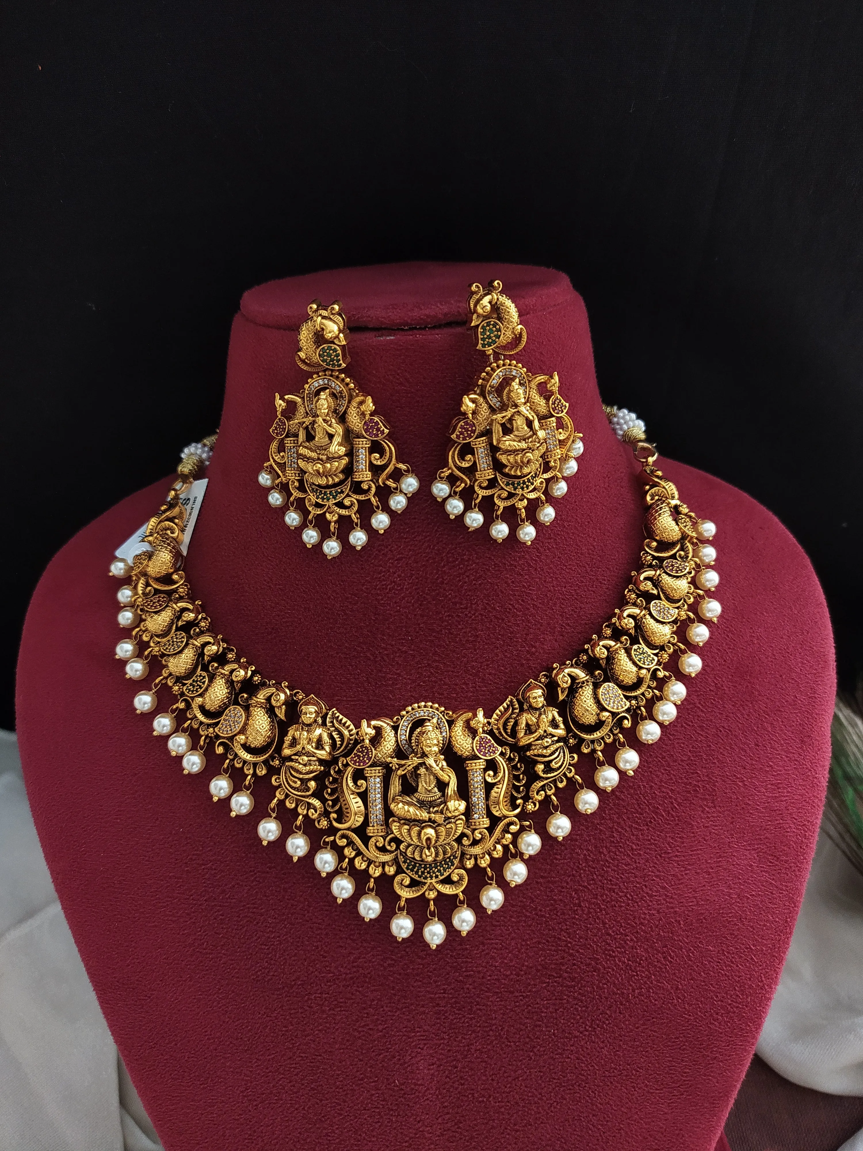 Antique Krishna Necklace Set with Nagas Work, Zircon Stones, and Pearl Drops"