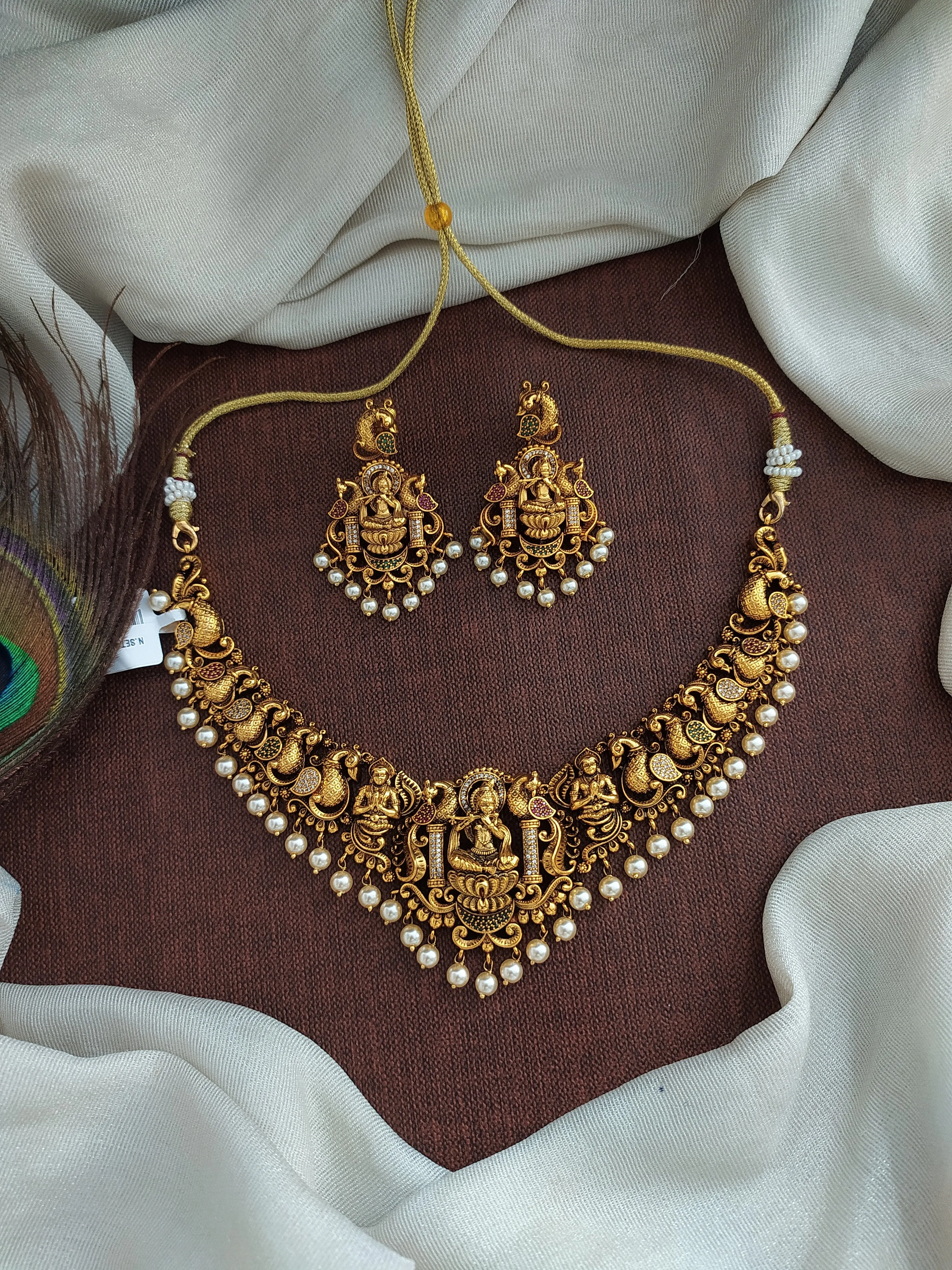 Antique Krishna Necklace Set with Nagas Work, Zircon Stones, and Pearl Drops"