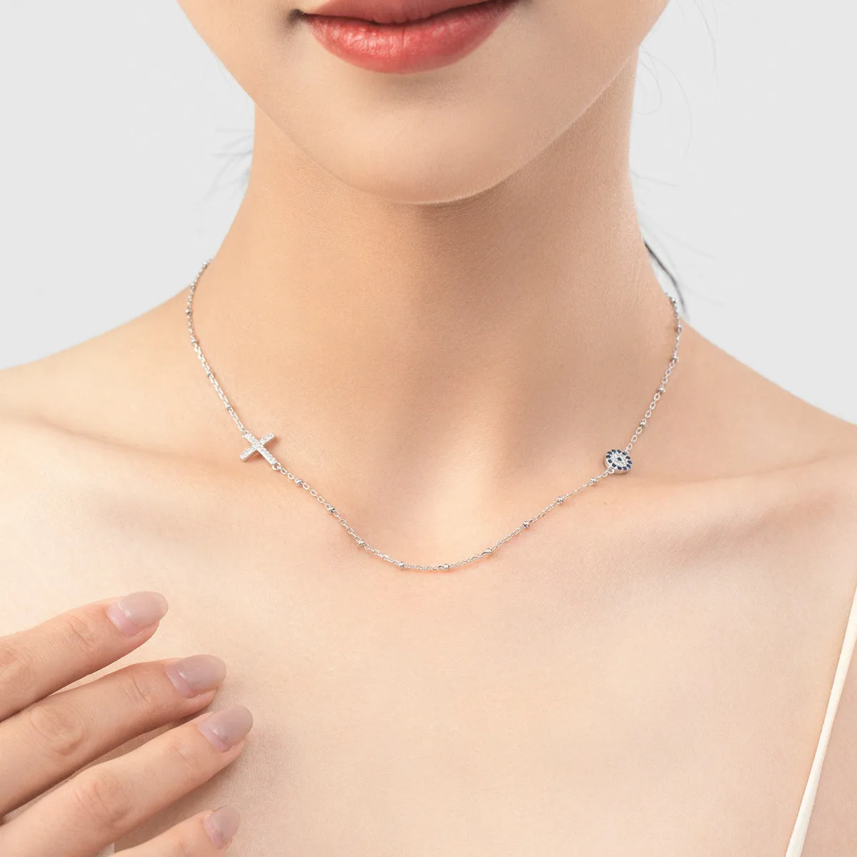 Chic Sterling Silver Blue Eye Necklace with Cross and Beaded Collarbone Chain