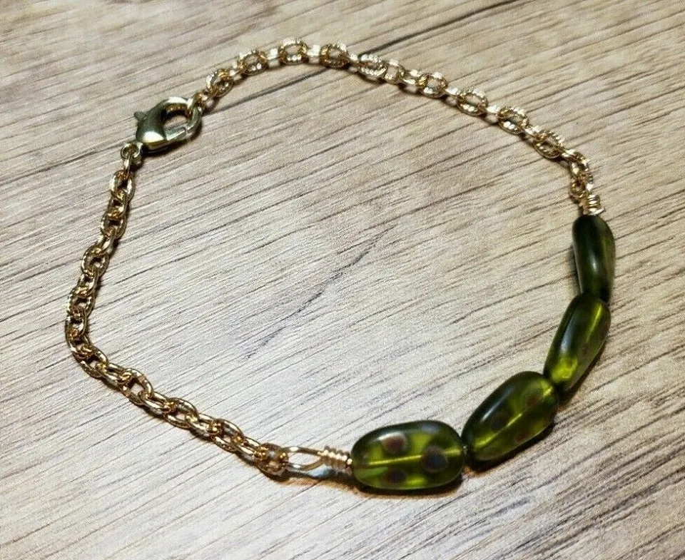 Hand Crafted, Painted Green Millefiori Glass & Gold Tone Chain Bracelet. Adjustable to 8.5" with Lobster Claw Clasp