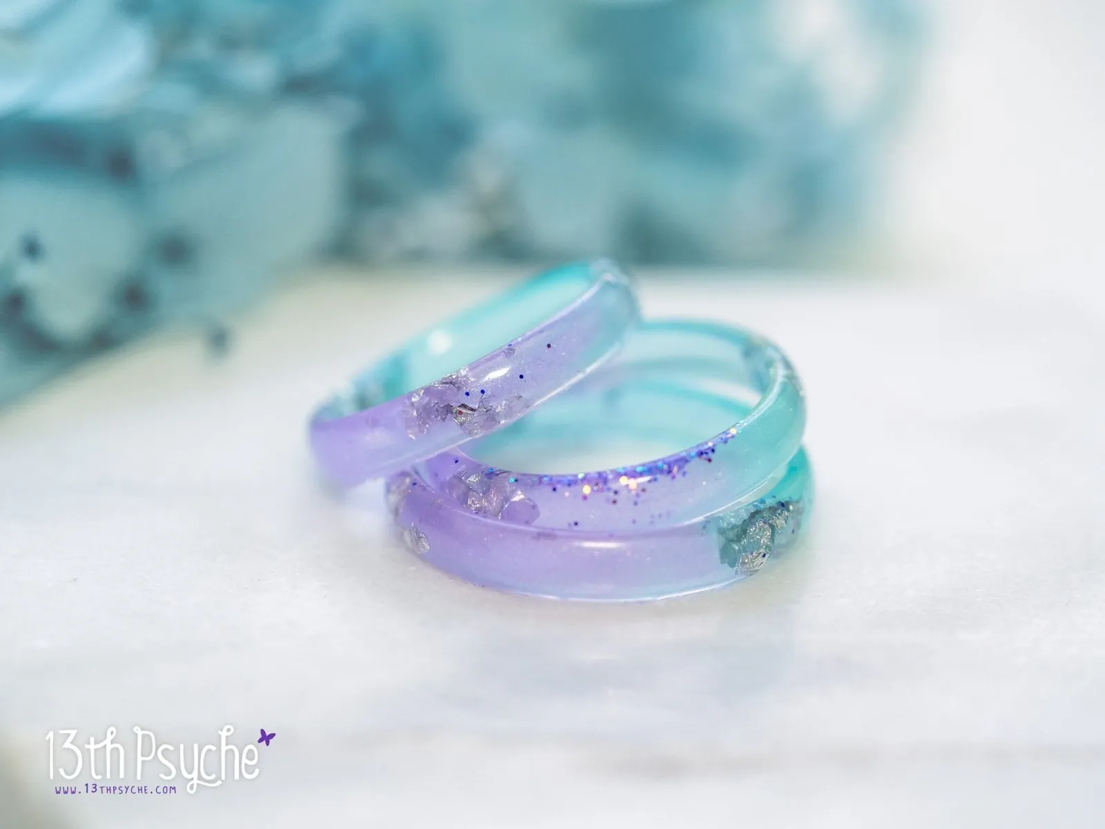 Lilac and turquoise resin ring with silver flakes