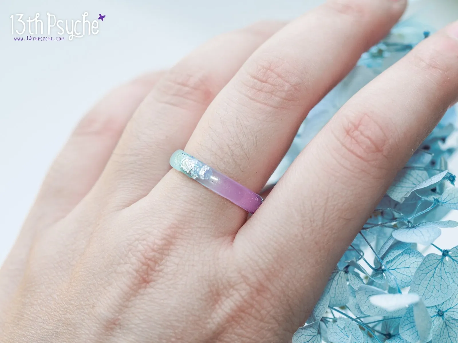 Lilac and turquoise resin ring with silver flakes