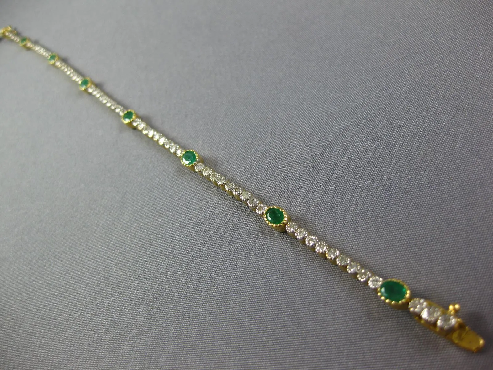 LONG 1.97CT DIAMOND & AAA EMERALD 18KT 2 TONE GOLD OVAL & ROUND TENNIS BRACELET