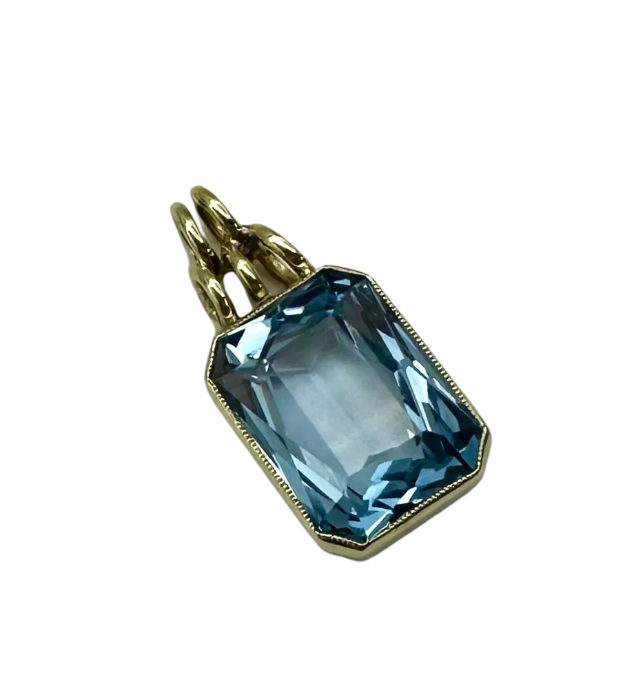 Radiant Cut Blue Topaz Pendant in 14K Yellow Gold