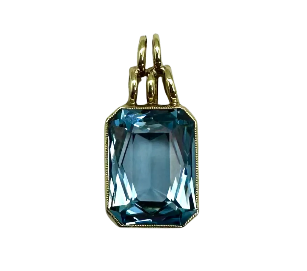 Radiant Cut Blue Topaz Pendant in 14K Yellow Gold