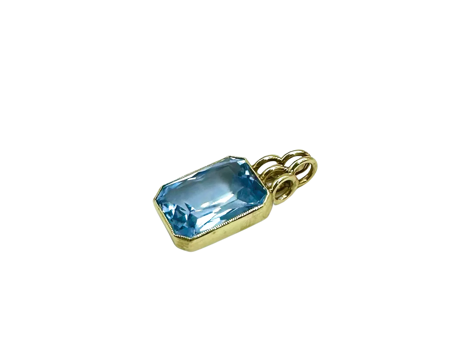 Radiant Cut Blue Topaz Pendant in 14K Yellow Gold