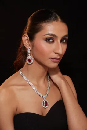 Rhodium Plated Zircon Studded With Red Synthetic Stone Pendant Necklace & Drop Earrings Set