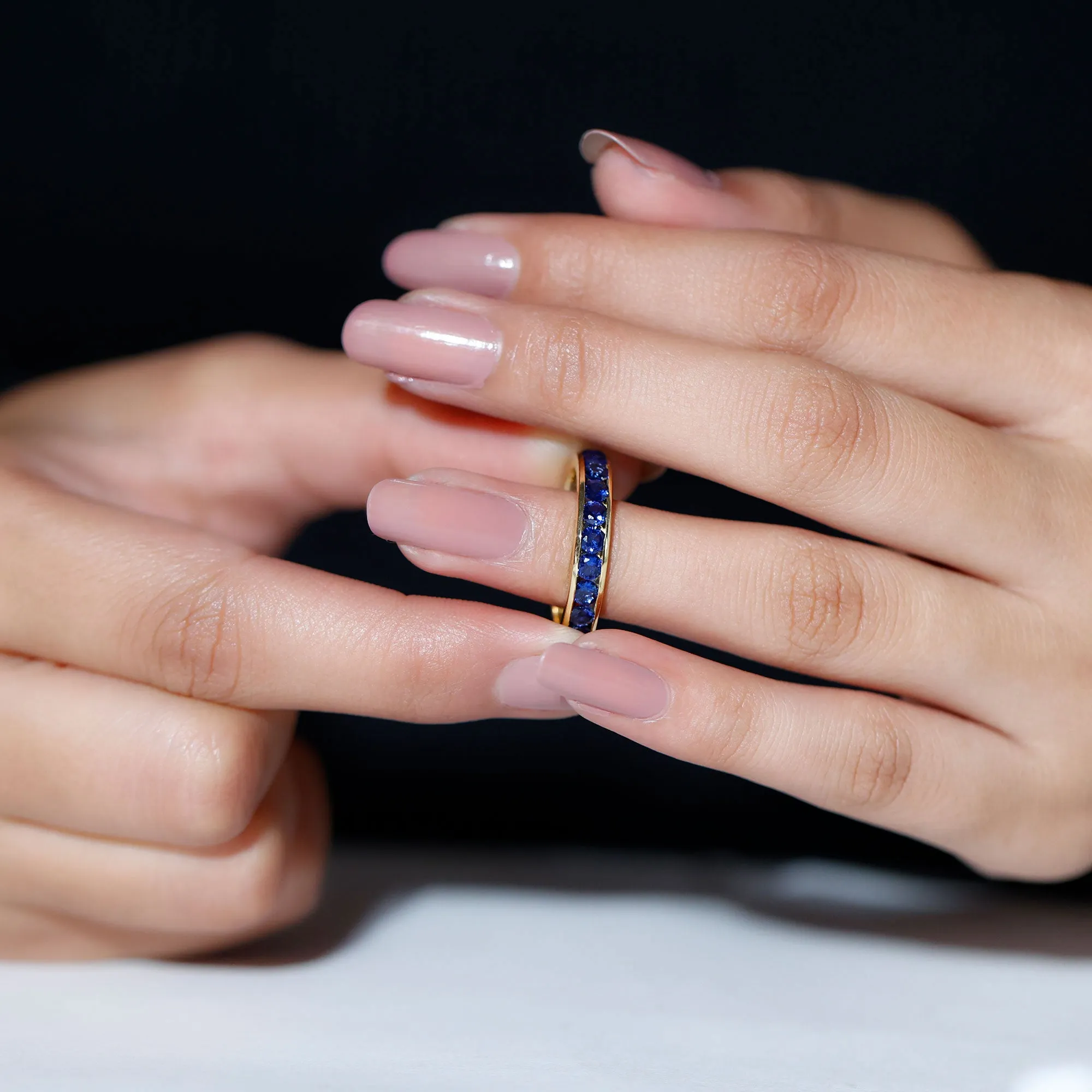 Round Created Blue Sapphire Full Eternity Ring in Channel Setting