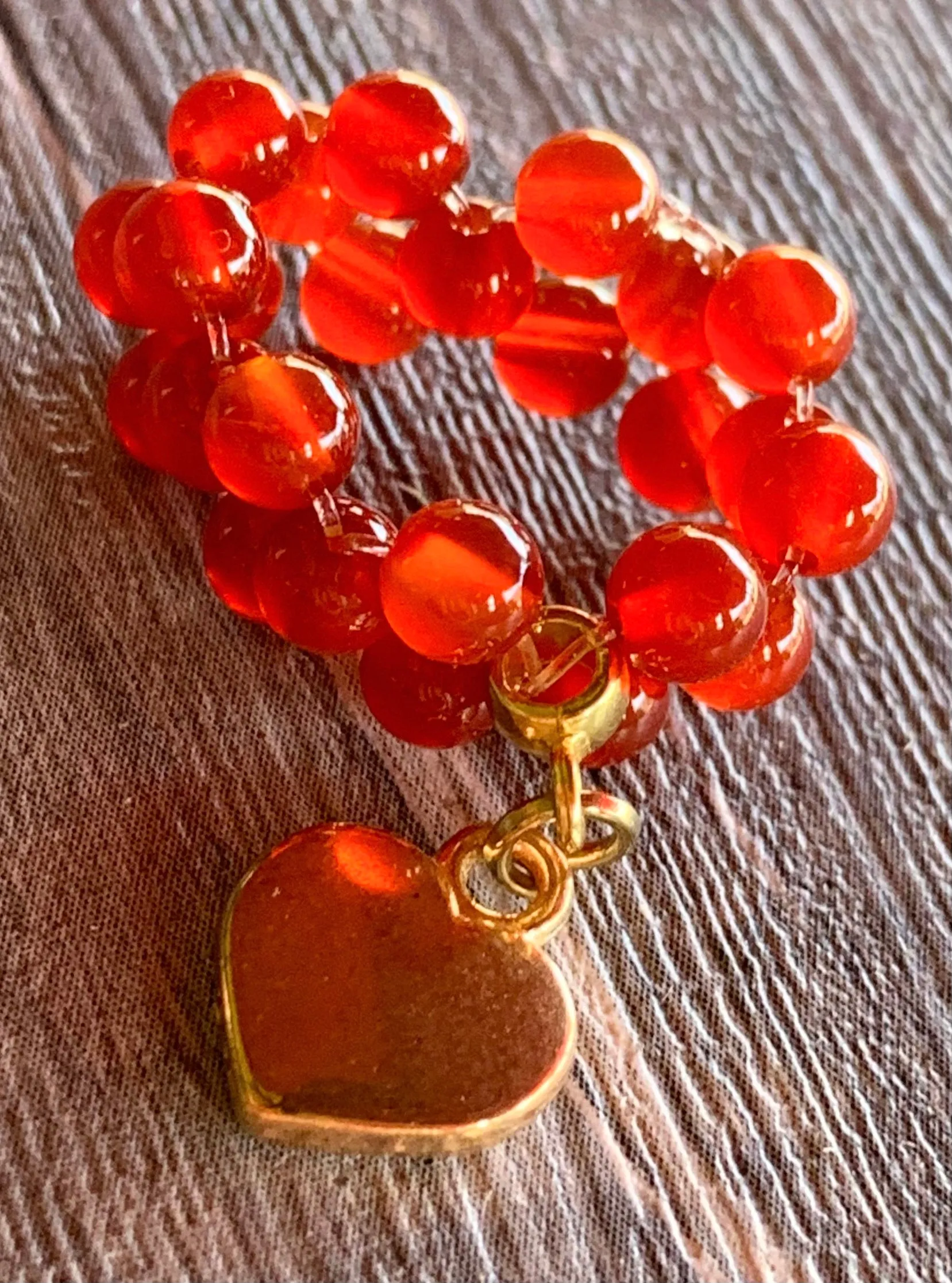 🔴SOLD🔴Phoenix Handmade Carnelian and Gold Hematite Expandable Ring with Dangle Heart Charm