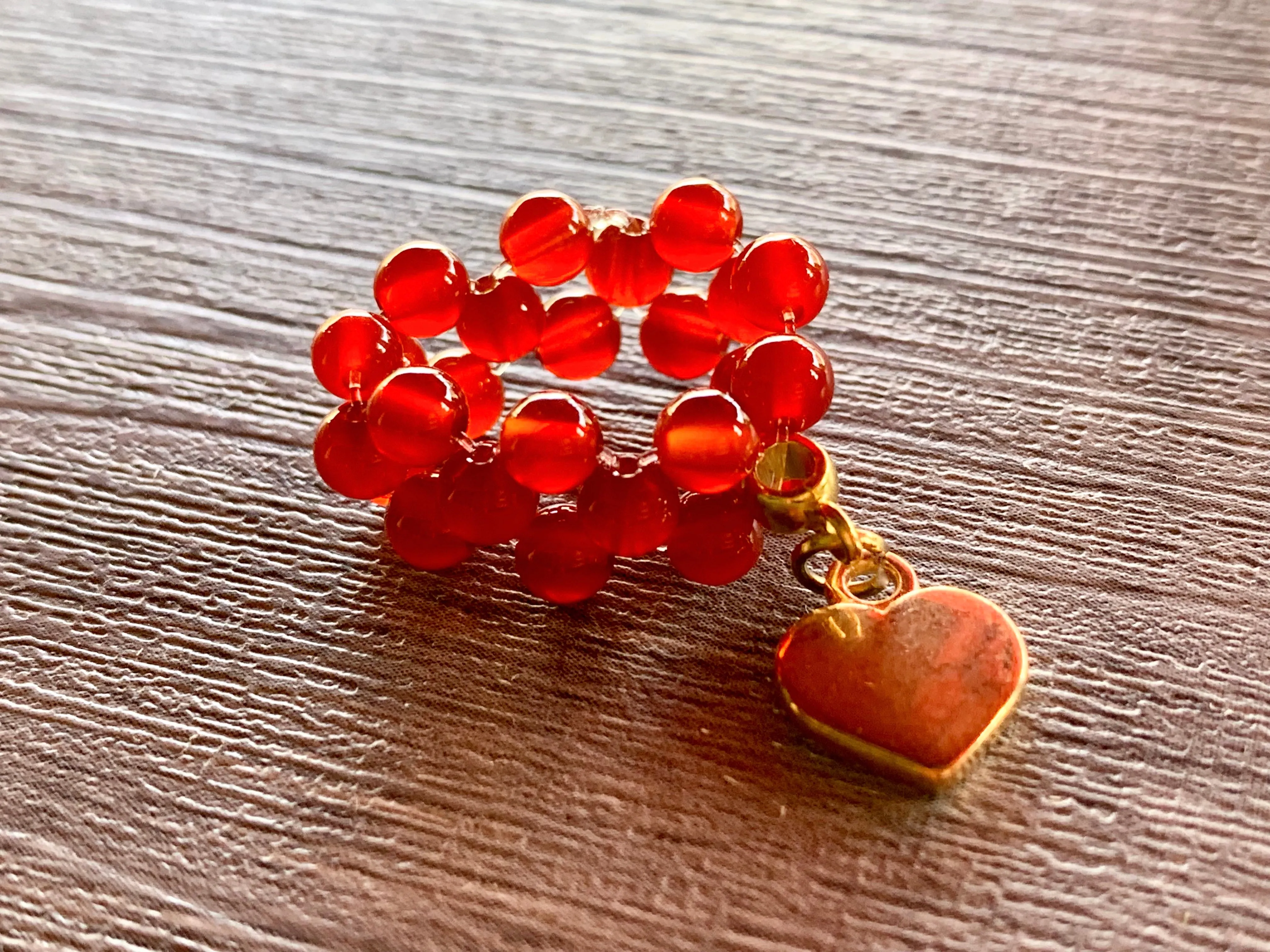 🔴SOLD🔴Phoenix Handmade Carnelian and Gold Hematite Expandable Ring with Dangle Heart Charm