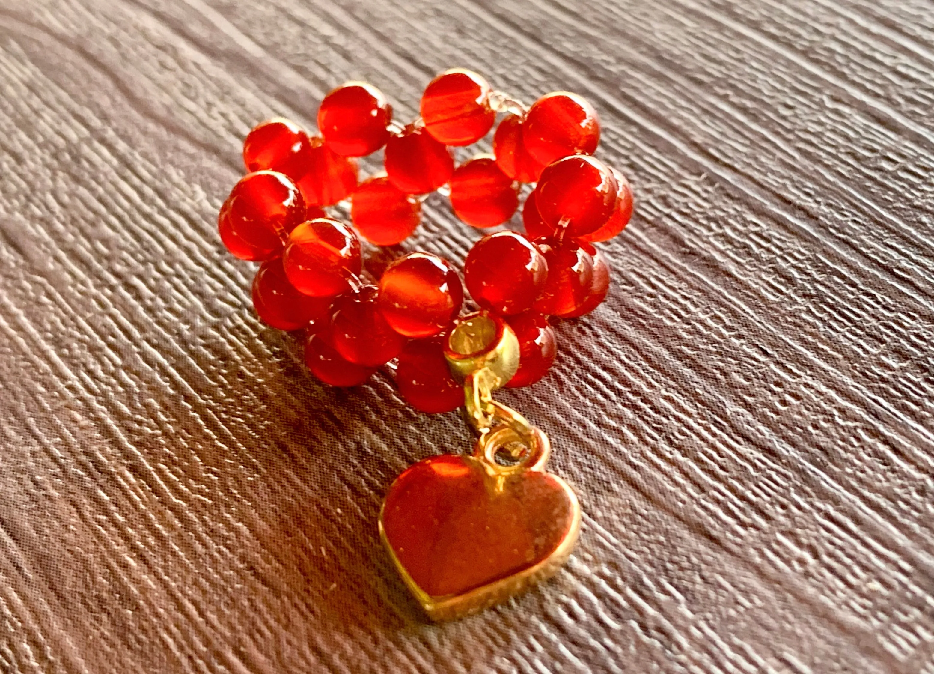 🔴SOLD🔴Phoenix Handmade Carnelian and Gold Hematite Expandable Ring with Dangle Heart Charm