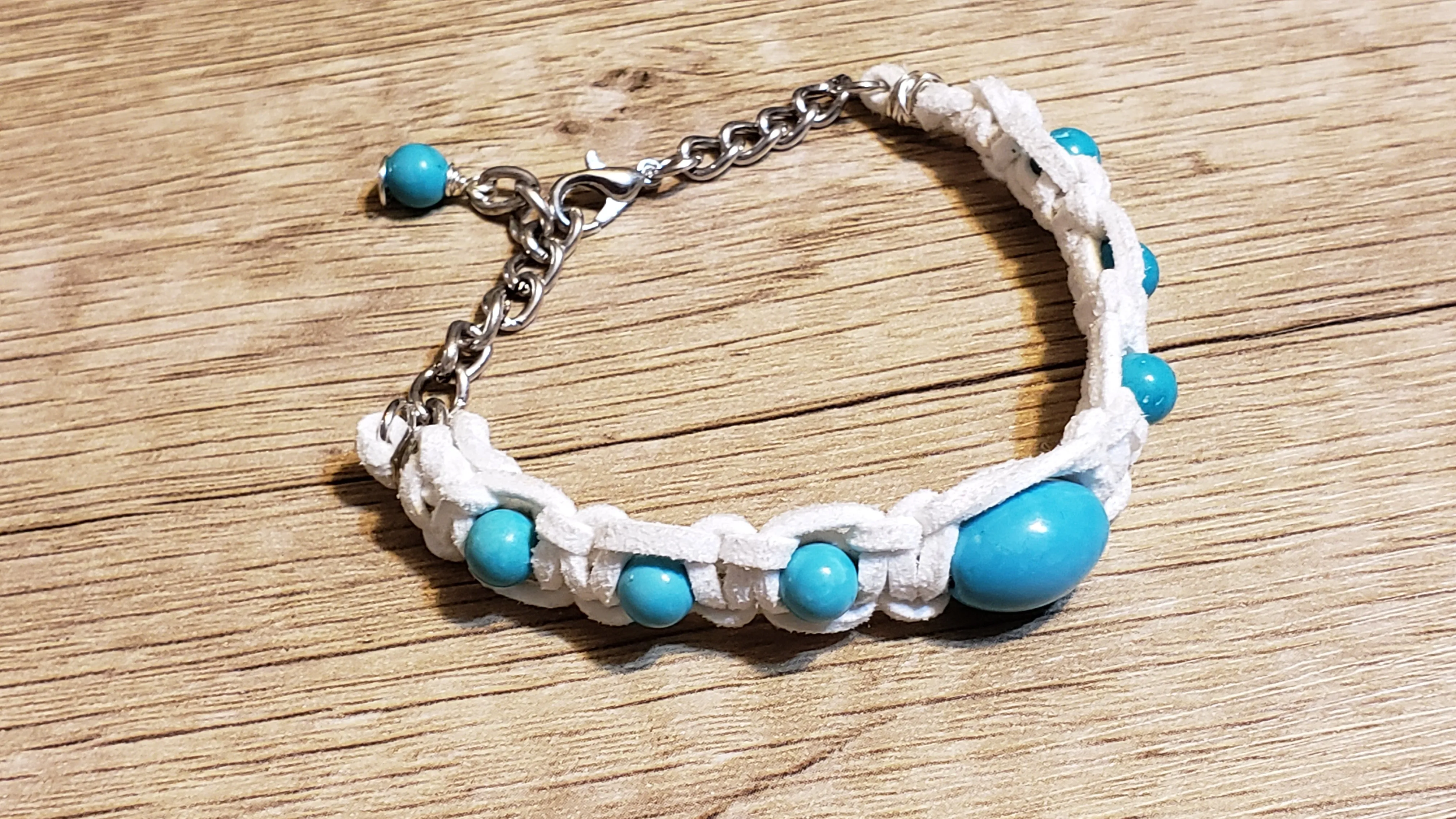 White Genuine Leather Bracelet with Light Blue Glass Beads & Stainless Steel Chain. Adjustable with Lobster Claw Clasp.